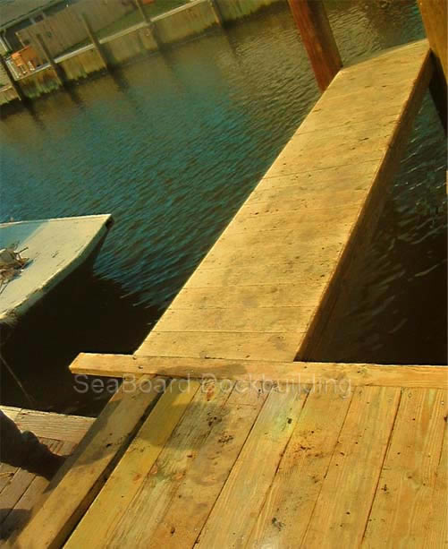 a wooden pier and part of the deck
